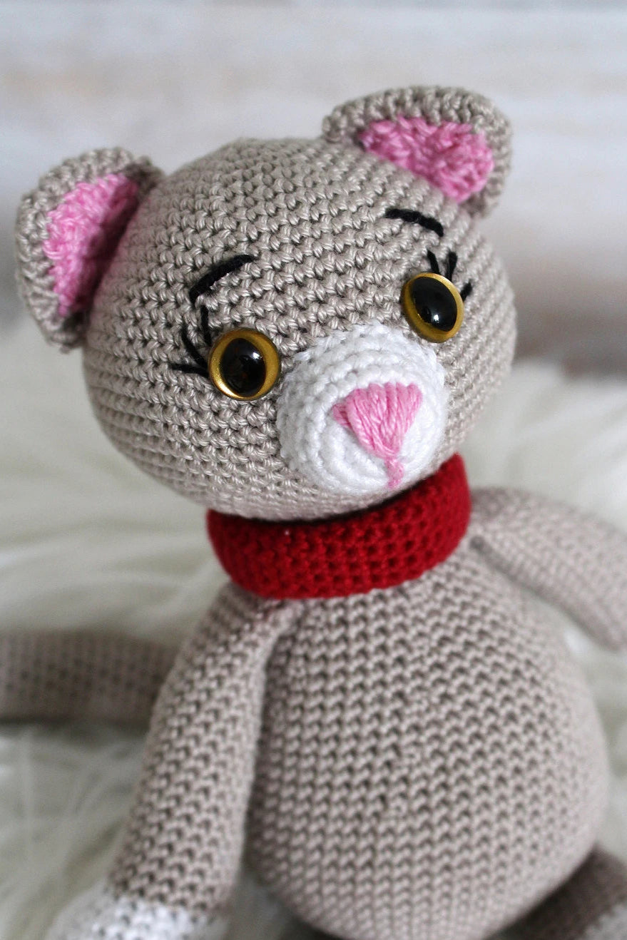 Peluche avec yeux securite de chat